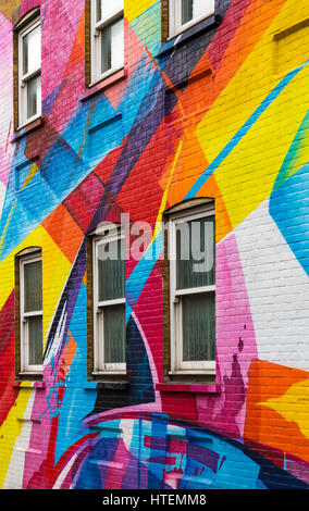Colourful mural graffiti on wall of building at Shoreditch, London in September Stock Photo
