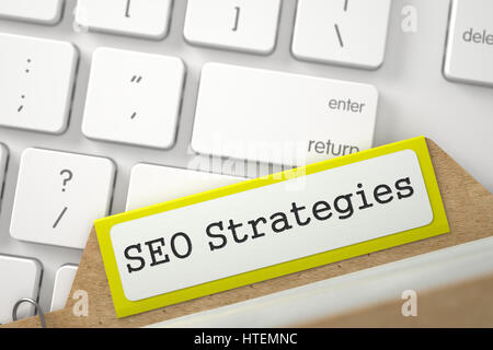 SEO Strategies. Yellow File Card on Background of White PC Keyboard. Archive Concept. Close Up View. Selective Focus. 3D Rendering. Stock Photo