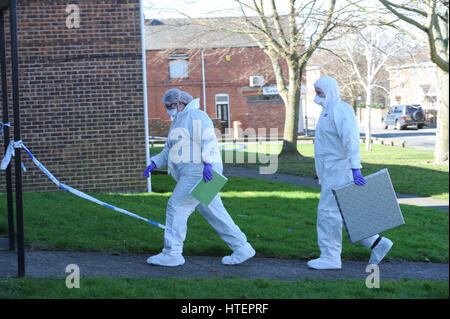 Crime scene investigation outside the front block of flats on Wadworth Street, Denaby Main near Doncaster, South Yorkshire where 18-year-old teen Lewi Stock Photo