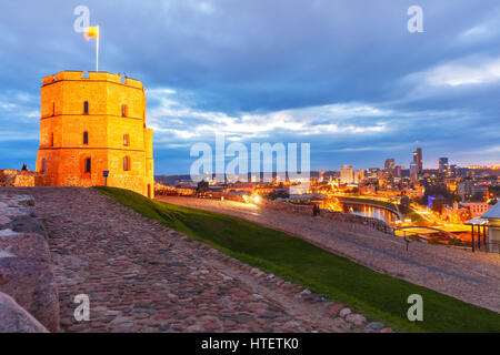 Cityscape with Gediminas Tower and skyscrapers of New Center of Vilnius during twilight blue hour, Vilnius, Lithuania, Baltic states. Stock Photo