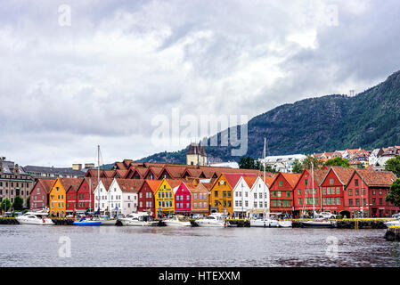 Bergen, Norway - August 14, 2016: View of the Bryggen district, a series of Hanseatic commercial buildings located in the harbor. Stock Photo