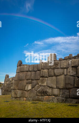Rainbow over Saksaywaman  ruins in Cusco - Peru Stock Photo