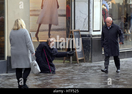 homeless in the uk begging on the street Stock Photo