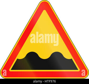 Warning road sign used in Belarus - Uneven road ahead. Stock Photo