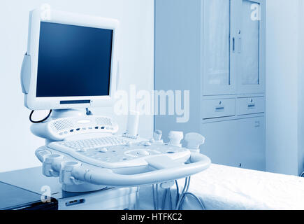 Interior of examination room with ultrasonography machine in hospital Stock Photo