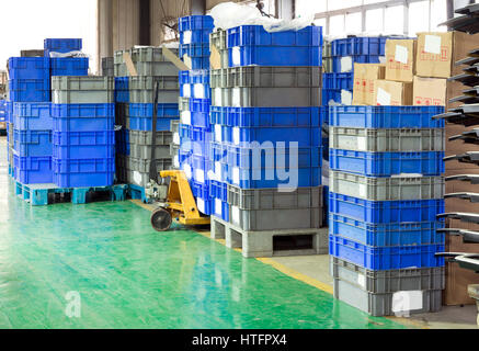 Bright Color Plastic Containers Piles. Horizontal shot Stock Photo