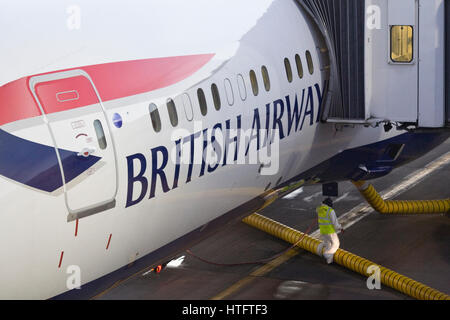 Refuelling an aircraft at the airport. Stock Photo