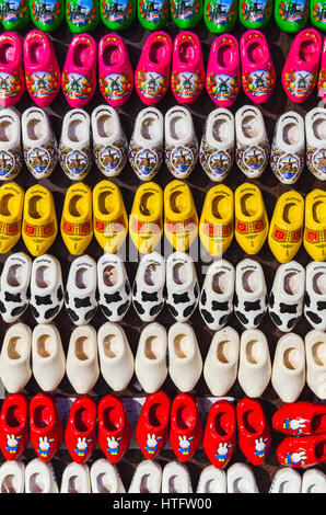 Zaanse Schans, Netherlands - February 25: Dutch clogs made of wood, souvenir magnets are on souvenir shop counter Stock Photo