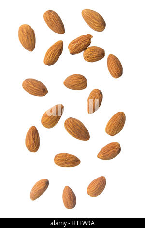 Falling almonds on white background. Stock Photo