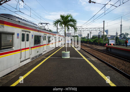 Train arriving to Gambir Station in Jakarta - Java, Indonesia Stock Photo