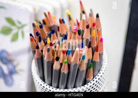 used color pencils in the pencil vase Stock Photo