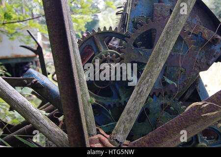 Forgotten, broken mechanism at the dump - gears Stock Photo