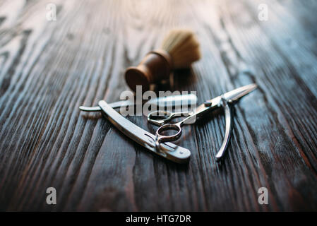 Shaving and barber shop equipment on wooden background, closeup Stock Photo