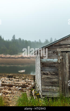 A morning fog lays over the Schoodic Peninsula at Acadia National Park in Maine. Stock Photo