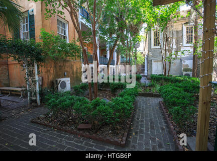 Courtyard between private homes in the downtown historical district of Charleston, South Carolina. Stock Photo