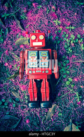 vintage red robot on the ground Stock Photo