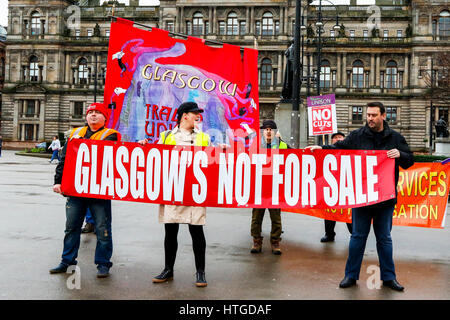 Glasgow, Scotland, UK. 11th March 2017. A Trades Union organised march and rally took place through Glasgow city centre to show objections to the financial cuts to public services and to the loss of jobs. The demonstration consisting of several Trades Unions and political affiliations began the march at Glasgow Green and finished at George Square, adjacent to the City Chambers and council headquarters. Credit: Findlay/Alamy Live News Stock Photo