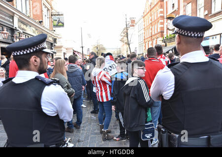 Covent Garden, London, UK. 11th Mar, 2017. Lincoln City football fans assemble in Covent Garden London before the Lincoln City vs Arsenal FA Cup Quarter-final matc. Credit: Matthew Chattle/Alamy Live News Stock Photo