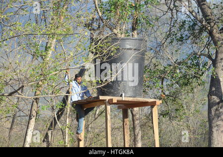 Conejo, Colombia. 03rd Mar, 2017. A man checks the water supply near the village of Conejo, Colombia, 03 March 2017. Around 300 FARC guerillas are due to surrender their weapons in a disarmament camp here by the end of May before beginning the transition into civilian life. Photo: Georg Ismar/dpa/Alamy Live News Stock Photo