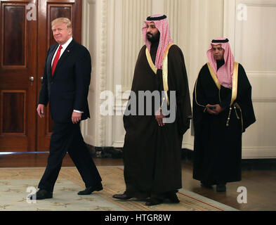 Washington DC, USA 14th March, 2017 United States President Donald Trump (L) walks into the State Dinning Room to have lunch with Mohammed bin Salman (C), Deputy Crown Prince and Minister of Defense of the Kingdom of Saudi Arabia, at the White House, Marc Stock Photo