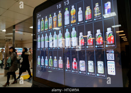 A smartphone controlled Acure vending machine in Tokyo Station on March 15, 2017, Tokyo, Japan. From March 14 Tokyo commuters can buy drinks using the ''acure pass'' app on their smartphones and collect the beverage from special machines using a QR code. The new vending machines produced by JR East Water Business will be installed in other stations throughout Tokyo. Credit: Rodrigo Reyes Marin/AFLO/Alamy Live News Stock Photo