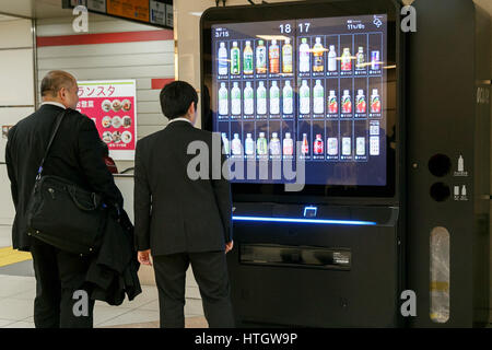 A smartphone controlled Acure vending machine in Tokyo Station on March 15, 2017, Tokyo, Japan. From March 14 Tokyo commuters can buy drinks using the ''acure pass'' app on their smartphones and collect the beverage from special machines using a QR code. The new vending machines produced by JR East Water Business will be installed in other stations throughout Tokyo. Credit: Rodrigo Reyes Marin/AFLO/Alamy Live News Stock Photo