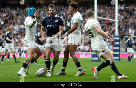 England's Anthony Watson celebrates scoring his sides 3rd try during the RBS Six Nations match at Twickenham Stadium, London. Stock Photo