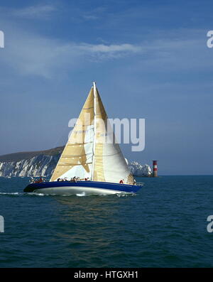 AJAXNETPHOTO. 1989. SOLENT, ENGLAND. - FASTNET RACE YACHT - THE U.S. MAXI YACHT NIRVANA PASSING THE NEEDLES LIGHTHOUSE ON THE FIRST LEG OF THE RACE TO FASTNET ROCK.   PHOTO:JONATHAN EASTLAND/AJAX  REF:890556 2 Stock Photo