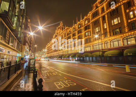 The famous Harrods department store in the night of February, 2017 at Knightsbridge in London, UK. Harrods is the biggest department store in Europe. Stock Photo