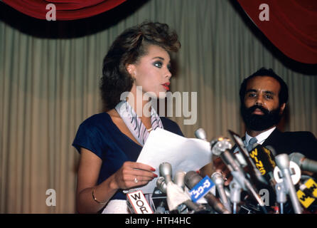 Vanessa Williams and manager Ramon Hervey at a press confrence for Williams' resignation as Miss America in July of 1984. Stock Photo