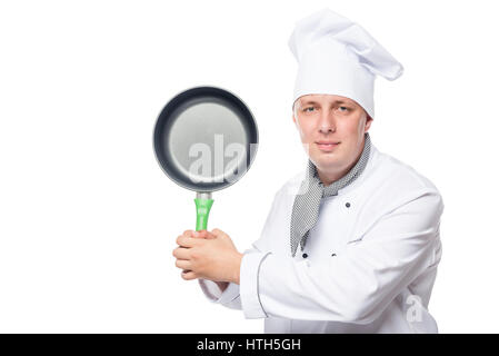 Cook in a suit with empty frying pan posing Stock Photo