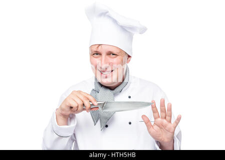 Cook in a suit holding a sharp knife and mysteriously smiling isolated Stock Photo