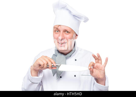 crazy chef with a sharp knife emotional portrait on a white background Stock Photo