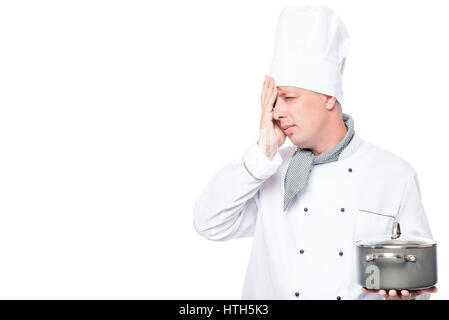 Male chef upset spoiled a dish on a white background Stock Photo