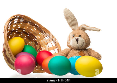 beautiful composition easter bunny and colored eggs on a white background Stock Photo