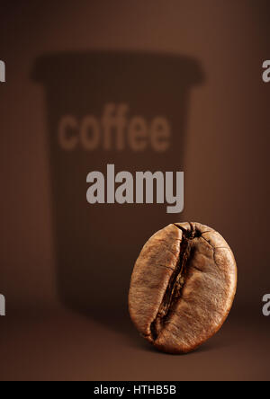 Coffee concept, bean with paper cup shadow on brown Stock Photo