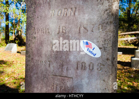 Sticker on a grave maker that indicates the person voted Stock Photo