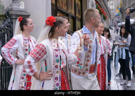 Concert of Romanian folkloric group near Manneken Pis in day of Folklorissimo 2016 Folkloric Festival and Weekend without Car in Brussels, Belgium, on Stock Photo