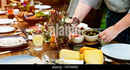 Woman Preparing Table Dinner Concept Stock Photo