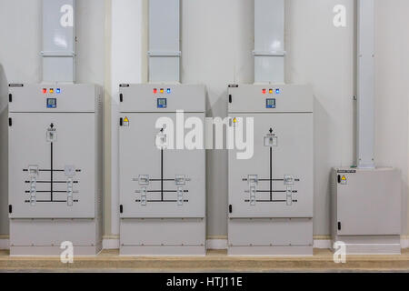 Electric control cabinet substation in a new factory plant. Stock Photo