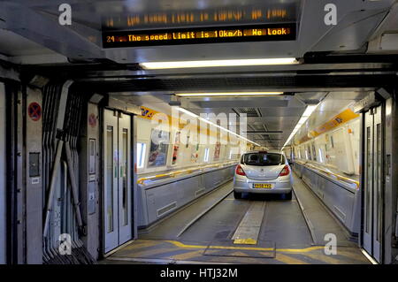 FOLKESTONE, ENGLAND, MAY 07 2016: Doors between carriages on the Euro Tunnel train from France to Folkestone in the United Kingdom are open as the car Stock Photo