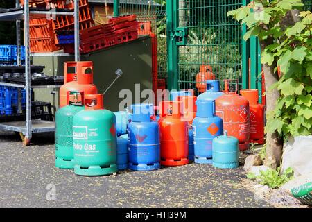 DORSET, ENGLAND, MAY 29 2016: Camping gas bottles stored on a campsite. Stock Photo