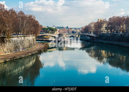 Rome, Italy - January 2, 2017: Bridge over the Tiber river passing through Rome, Italy Stock Photo