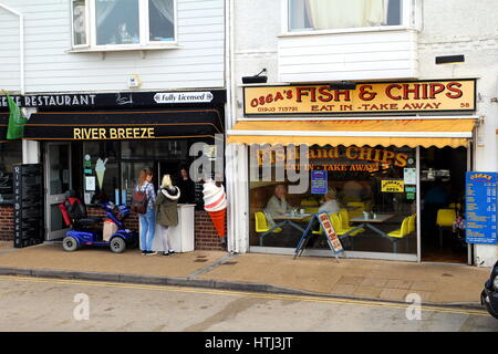 Littlehampton, UK - October 25th 2016: Traditional fish and chip shops on the sea front, selling both eat in and takeaway fish and chips Stock Photo