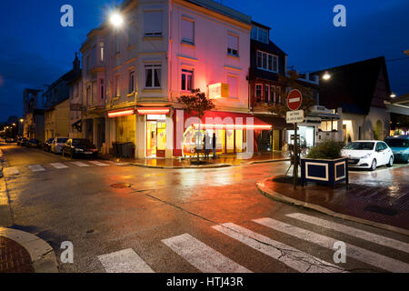 illuminated urban crossroad at night in Le Touquet-Paris Plage, North France Stock Photo