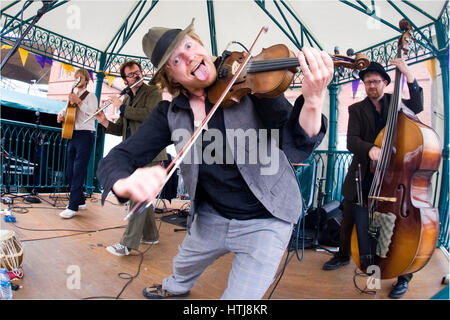 Fiddle player, part of a folk band playing at Cardiff Harbour Festival, Cardiff Bay, Cardiff, Wales. Stock Photo