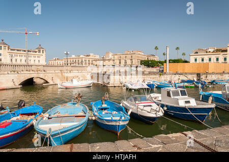 SYRACUSE, ITALY - SEPTEMBER 14, 2015: Fishing boats in the city of Syracuse, Sicily Stock Photo