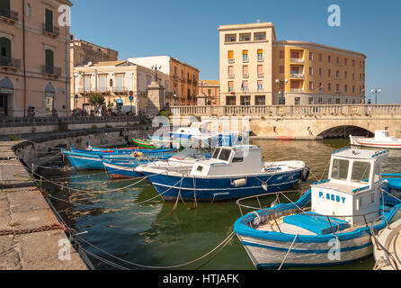 SYRACUSE, ITALY - SEPTEMBER 14, 2015: Fishing boats in the city of Siracuse, Sicily Stock Photo