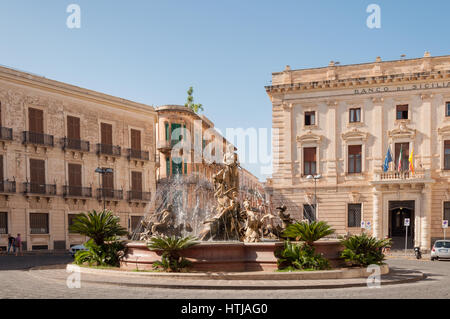 SYRACUSE, ITALY - SEPTEMBER 14, 2015: The fountain on the square Archimedes in Syracuse. Stock Photo