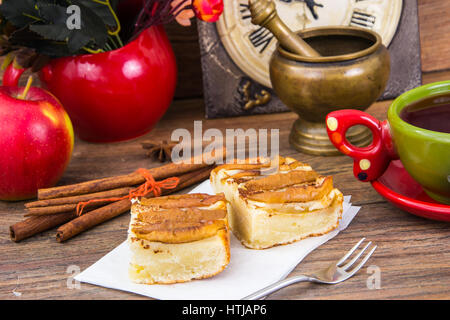 Apple pie with cinnamon, tea hibiscus. Studio Photo Stock Photo